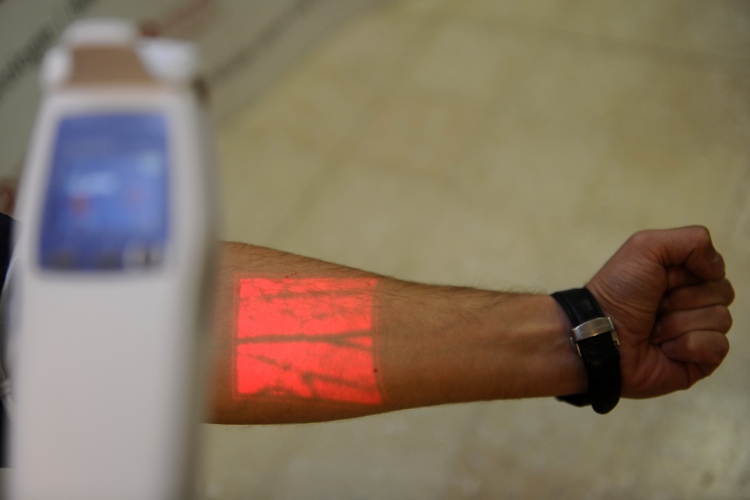 Vein Visualisation Device on patient's forearm
